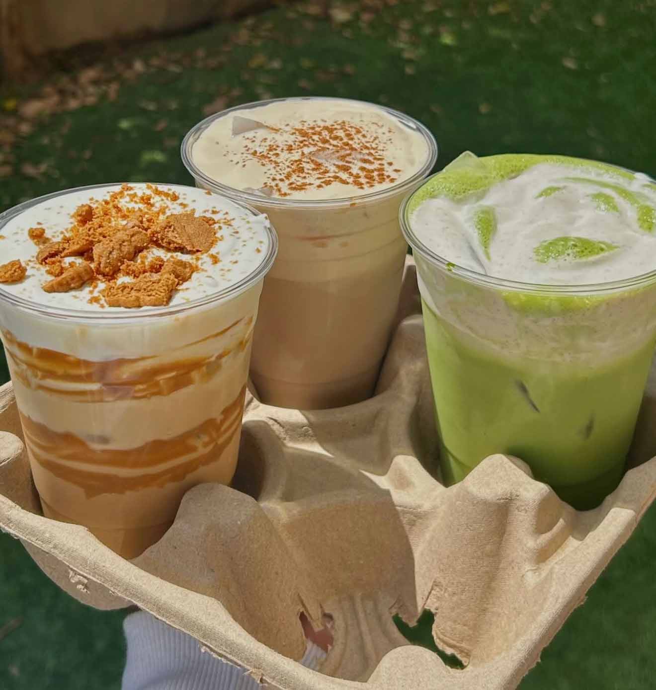 Guests enjoying handcrafted coffee at outdoor wedding