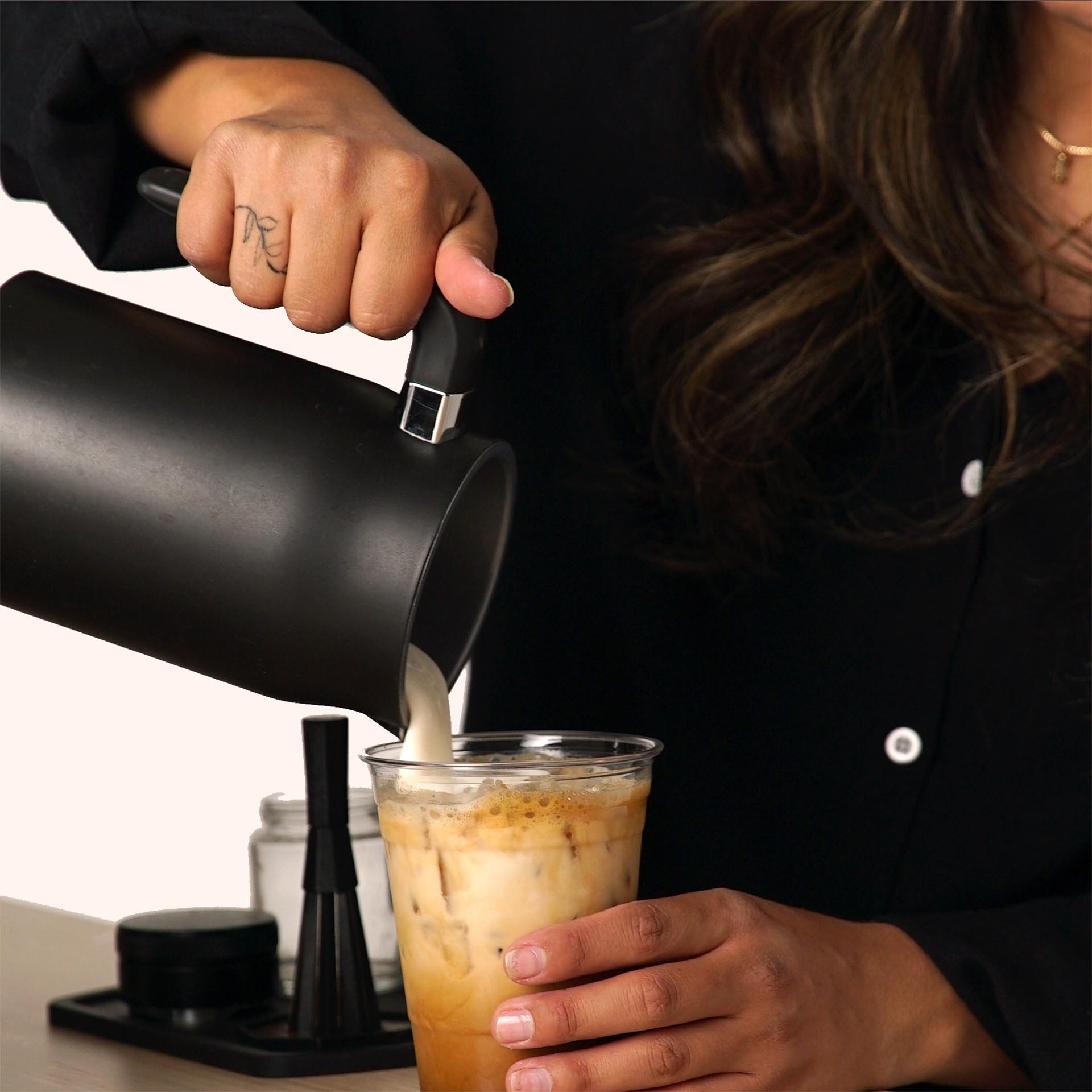 Barista serving coffee at a corporate event in Downey